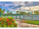 Well-maintained tennis courts with lush greenery and clear signage at 5240 Hyland Hills Ave # 1426, Sarasota, FL 34241