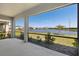 Screened lanai with views of the lake at 5744 Woodland Sage Dr, Sarasota, FL 34238