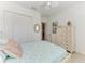 Bright bedroom with a large closet and dresser, offering ample storage space at 5817 Brandon Run, Bradenton, FL 34211