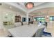 Bright dining room features stylish lighting, comfortable seating, and an open floor plan at 5817 Brandon Run, Bradenton, FL 34211