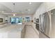 Spacious kitchen featuring a large center island and modern appliances at 5817 Brandon Run, Bradenton, FL 34211