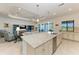 Open kitchen design with a large island and views to the living area at 5817 Brandon Run, Bradenton, FL 34211
