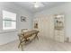 Bright, functional office space with a Murphy bed and built-in shelving for a comfortable work environment at 5817 Brandon Run, Bradenton, FL 34211