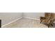 Cozy corner with an accent chair and wood-look floors, offering a relaxing space at 5998 Amberly Dr, Bradenton, FL 34208