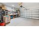 Well-organized garage with tools, workbench, rolling cabinet and ample storage space at 5998 Amberly Dr, Bradenton, FL 34208