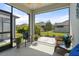This screened-in patio offers backyard views at 5998 Amberly Dr, Bradenton, FL 34208