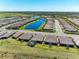 Aerial view of a new home community featuring stunning lake views at 6179 Mesa Gln, Bradenton, FL 34203