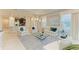 Elegant living room with stylish furniture, a glass table, and ample natural light at 6179 Mesa Gln, Bradenton, FL 34203