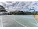 Outdoor basketball court with well-maintained surface and hoops at 6415 Fetterbush Ln, Lakewood Ranch, FL 34202