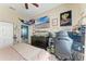 Unique bedroom featuring a TV, desk, and quirky decor at 6415 Fetterbush Ln, Lakewood Ranch, FL 34202