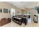 Spacious living room with neutral colors, modern décor, and sliding glass doors offering ample light at 6415 Fetterbush Ln, Lakewood Ranch, FL 34202