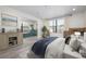 Bright bedroom features a large window and seamlessly connects to a spa-like bathroom for ultimate relaxation at 6814 68Th E Ave, Bradenton, FL 34203