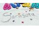 The word 'Sarasota' written in the sand with starfish and colorful flip-flops at 7151 Wood Creek Dr # 205, Sarasota, FL 34231