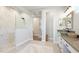 Bathroom features a large glass and marble shower and a vanity at 7211 Prestbury Cir, Lakewood Ranch, FL 34202