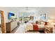 Bright and spacious main bedroom suite with tray ceiling and view of the lake at 7211 Prestbury Cir, Lakewood Ranch, FL 34202
