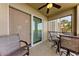 Relaxing outdoor patio area with comfortable chairs for enjoying the outdoor views at 7803 Grand Estuary Trl # 303, Bradenton, FL 34212