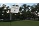 Scenic golf course view featuring The Founders Club flag and lush green landscape at 8847 Colonels Ct, Sarasota, FL 34240