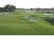 Expansive golf course with multiple sand traps, showcasing the meticulously maintained grounds at 8847 Colonels Ct, Sarasota, FL 34240