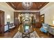 Inviting lobby with wood accents, a large table, and comfortable seating at 8847 Colonels Ct, Sarasota, FL 34240