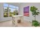 Bright office space with large windows overlooking manicured lawn at 8847 Colonels Ct, Sarasota, FL 34240