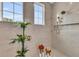 Bright shower featuring white marble-style tile and two shower heads at 8847 Colonels Ct, Sarasota, FL 34240