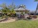 Charming gazebo surrounded by mature landscaping in a quiet and peaceful setting at 926 Capri Isles Blvd # 228, Venice, FL 34292