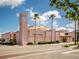 Beautiful Venice Theatre with a brick road, palm trees, blue skies and perfect photo opportunities at 926 Capri Isles Blvd # 228, Venice, FL 34292