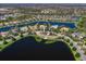 An aerial view of a beautiful home on a peninsula in the lake at 7921 Waterton Ln, Lakewood Ranch, FL 34202