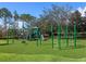 Outdoor playground with various play structures and equipment, providing a fun space for children at 7921 Waterton Ln, Lakewood Ranch, FL 34202
