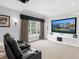 Home theater with comfortable seating, a large screen, and custom millwork at 7921 Waterton Ln, Lakewood Ranch, FL 34202