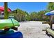 View of Canoe and Kayak parking area adjacent to the launch point surrounded by lush landscaping at 1020 Tidewater Shores Loop # 107, Bradenton, FL 34208