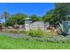Elegant entrance sign for Tidewater Preserve surrounded by lush landscaping and a tranquil water feature at 1020 Tidewater Shores Loop # 107, Bradenton, FL 34208