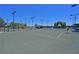 Well-maintained tennis courts with lights, overlooking the community at 1020 Tidewater Shores Loop # 107, Bradenton, FL 34208