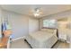 Inviting bedroom with a fan, laminate floors, and a window to enjoy natural light at 1127 133Rd E St, Bradenton, FL 34212