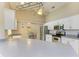 Modern kitchen with stainless steel appliances and a view into the dining room at 1127 133Rd E St, Bradenton, FL 34212