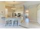 Bright kitchen area with a breakfast bar, and access to the entryway at 1127 133Rd E St, Bradenton, FL 34212