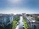Waterfront community featuring lush landscaping, ocean views, and waterway access at 1250 N Portofino Dr # 201, Sarasota, FL 34242