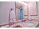 Bathroom vanity with sink and decor at 1250 N Portofino Dr # 201, Sarasota, FL 34242