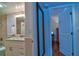 Bathroom with vanity and open doorway at 1250 N Portofino Dr # 201, Sarasota, FL 34242