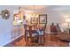 Comfortable dining room featuring hardwood floors at 1250 N Portofino Dr # 201, Sarasota, FL 34242