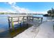 Picturesque dock overlooking the water, perfect for boating and enjoying the view at 1250 N Portofino Dr # 201, Sarasota, FL 34242