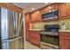 Updated kitchen with stainless steel appliances and granite countertops at 1250 N Portofino Dr # 201, Sarasota, FL 34242