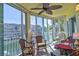 Enclosed lanai providing stunning waterfront views at 1250 N Portofino Dr # 201, Sarasota, FL 34242