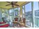 Enclosed lanai providing amazing waterfront views at 1250 N Portofino Dr # 201, Sarasota, FL 34242