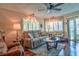 Inviting living room with hardwood floors and lots of natural light at 1250 N Portofino Dr # 201, Sarasota, FL 34242