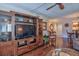 Spacious living area featuring wood floors with access to kitchen at 1250 N Portofino Dr # 201, Sarasota, FL 34242