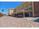 Covered parking featuring pavers and easy access to the residences at 1250 N Portofino Dr # 201, Sarasota, FL 34242
