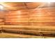 Interior view of the sauna with wooden benches and a light at 1250 N Portofino Dr # 201, Sarasota, FL 34242