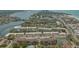 Aerial view of community with condos, beaches and waterfront access at 1250 N Portofino Dr # 303, Sarasota, FL 34242
