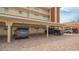 Covered parking area at condo complex, offering ample space for vehicles and residents at 1250 N Portofino Dr # 303, Sarasota, FL 34242